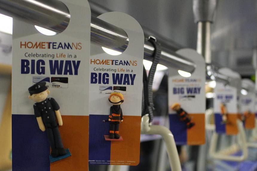 Some 20,000 figurines will be given out on MRT trains from now till March next year as part of a HomeTeamNS campaign to recognise the Home Team's national servicemen and their families.&nbsp;-- PHOTO: HOMETEAMNS&nbsp;