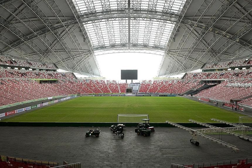 The SportsHub Pte Ltd (SHPL) announced on Saturday that it will grow a natural grass pitch in a nursery that will be transported and laid at the National Stadium in time for June's SEA Games hosted in Singapore. -- PHOTO: ST FILE