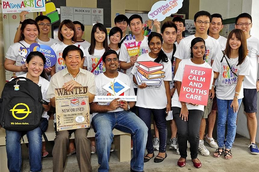 The Sembawang CC Youth Executive Committee organised a donation drive to collect backpacks, story books and stationary from residents to give to needy children for the new year; Minister for National Development Khaw Boon Wan (front row, second from 