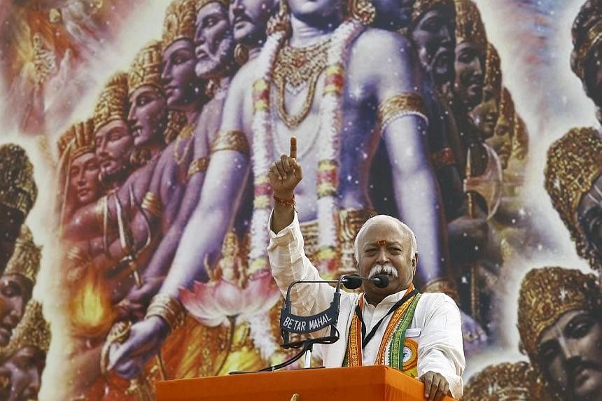 Mohan Bhagwat, chief of India's Hindu nationalist organisation Rashtriya Swayamsevak Sangh (RSS), addresses a rally in Kolkata on Dec 20, 2014.&nbsp;Mr Bhagwat vowed to press ahead with a campaign to convert Muslims and Christians to Hinduism, stokin