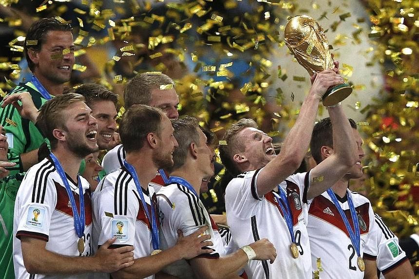 Germany fans have bought more than three million of the white shirt Joachim Loew's side wore when they won the football World Cup in Brazil in July, according to a report Sunday, Dec 21, 2014. -- PHOTO: AFP