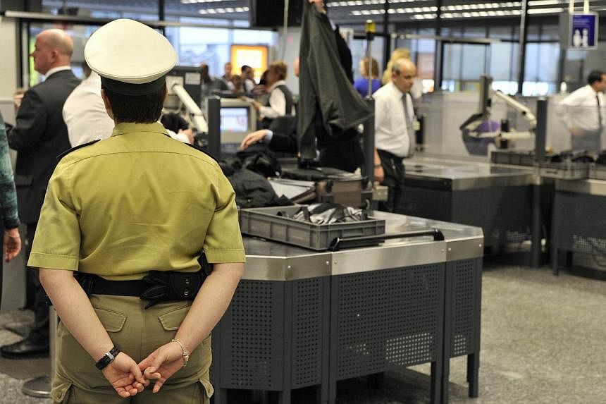 This photo taken on Feb 2, 2010, shows flight passengers at the security control at the airport in Frankfurt.&nbsp;An EU probe has found major security lapses at Germany's biggest airport in Frankfurt enabling weapons and other items to be smuggled t