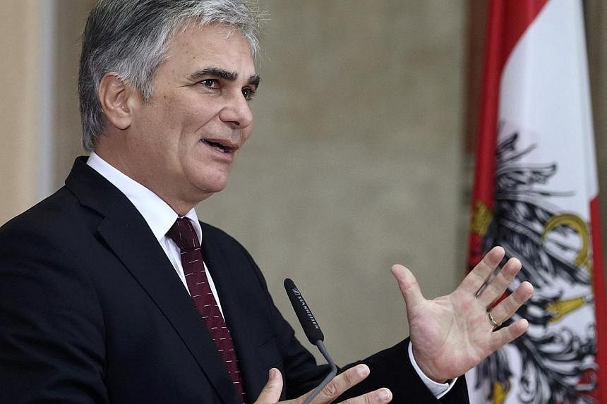 The head of Austria's government, Chancellor Werner Faymann,&nbsp;criticised fellow European Union countries on Saturday that are calling for tougher sanctions against Moscow, warning against pushing the Russian economy towards collapse. -- PHOTO: RE