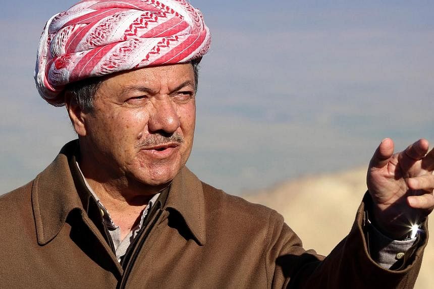 Iraqi Kurdish leader Masoud Barzani speaks to journalists today during a visit to Mount Sinjar in the autonomous Kurdistan region, in northwestern Iraq. Barzani hailed advances by peshmerga fighters against the Islamic State in Iraq and Syria (ISIS) 