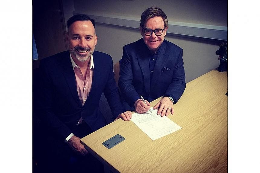 "That's the legal bit done. Now on to the ceremony!" Elton John and David Furnish got married on Sunday, Dec 21, 2014. Elton provided 'live' coverage of the day's events on his Instagram. --PHOTO: ELTON JOHN/INSTAGRAM