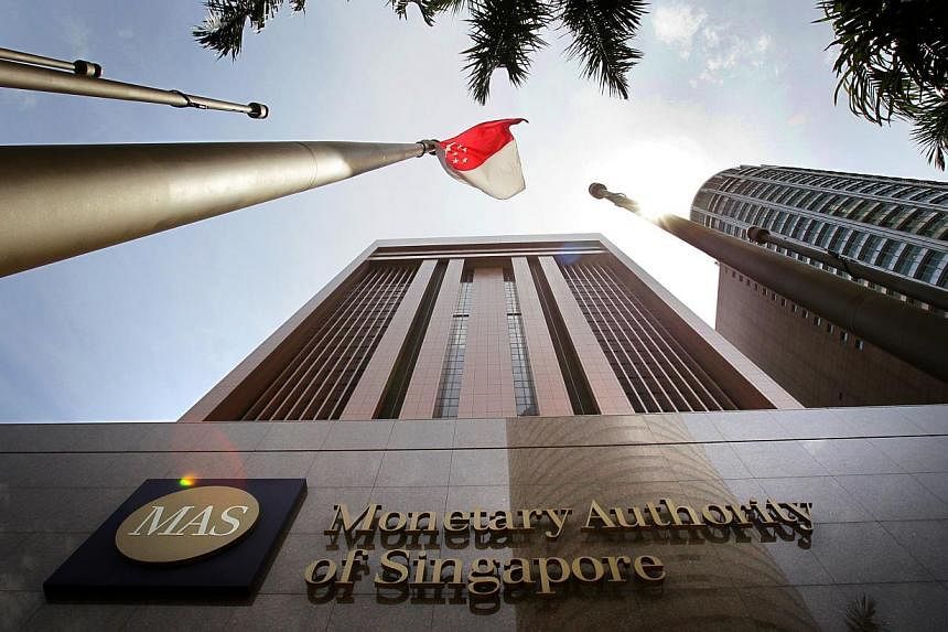 The Monetary Authority of Singapore (MAS) building. Singapore's headline inflation rate in November may turn negative for the first time in five years due partly to sliding oil prices, and a few economists see scope for the central bank to ease tight