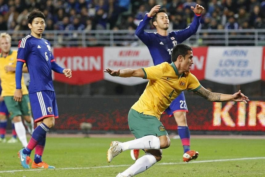 Tim Cahill (front right) of Australia celebrates after scoring against Japan during their international friendly soccer match in Osaka, western Japan on Nov 18, 2014.&nbsp;Australia's all-time leading goal-scorer Tim Cahill is feeling as fit as ever 