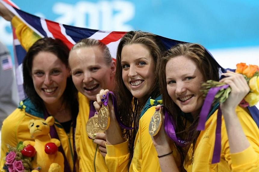 (Left to right)&nbsp;Australia's Alicia Coutts, Melanie Schlanger, Brittany Elmslie and Cate Campbell celebrate with their Gold medals at the London 2012 Olympic Games. World 100 metres freestyle champion Cate Campbell was named Australia's Swimmer o