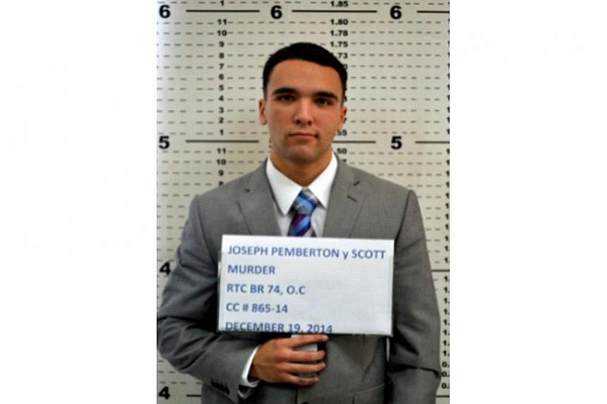 This handout photo released by Olongapo City Police Public Information Office taken on Dec 19, 2014, shows Private First Class Joseph Pemberton at the Olongapo police station in Olongapo, north of Manila. -- PHOTO: AFP