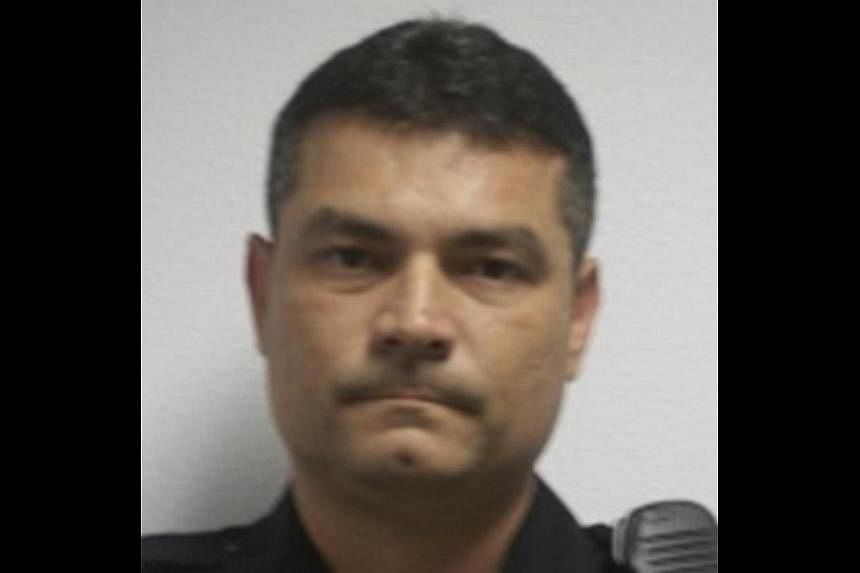 Officer Charles Kondek, 45, is shown in this handout photo provided by the Penellas County Sheriff's Office in Tampa, Florida on Sunday. Kondek was shot and killed while on duty early Sunday, law enforcement officials said, providing no details about