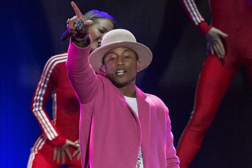 Pharrell performing at the Z100's Jingle Ball 2014 at Madison Square Garden in New York on Dec 12, 2014. -- PHOTO: REUTERS