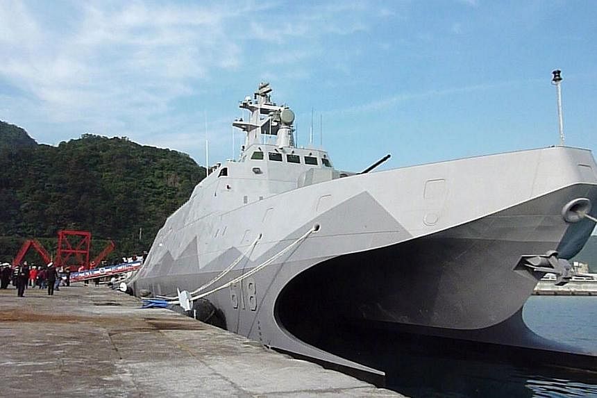 Taiwan's first domestically-produced missile corvette, the 500-ton ship Tuo Chiang (Tuo River), is pictured during the vessel's launch ceremony at the naval port at Suao in northeastern Taiwan's Yilan county on Dec 23, 2014.&nbsp;Taiwan on Tuesday la