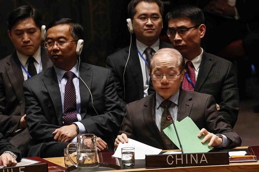 China's Ambassador to the United Nations Liu Jieyi speaks before voting against a measure to adopt the agenda of human rights violations in North Korea during a meeting of the United Nations Security Council to discuss in North Korea on Dec 22, 2014 