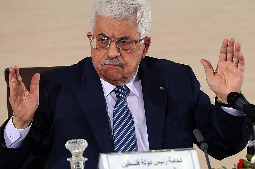 Palestinian President Mahmud Abbas speaks during a press conference held at the Ministry of Foreign Affairs on Tuesday in Algiers. Abbas is on a three-day official visit and met the day before Algerian President Abdelaziz Bouteflika. -- PHOTO: AFP