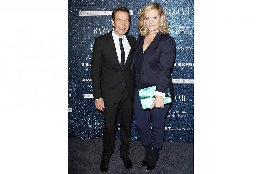Artist Jeff Koons and wife Justine Wheeler Koons at the 2014 Women's Leadership Award honouring Stella McCartney at Alice Tully Hall in New York on Nov 13, 2014. A sculpture by US pop artist Jeff Koons has been pulled from a retrospective of his work