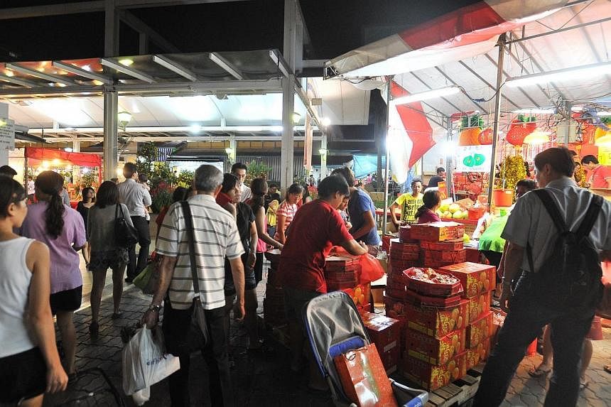 The Aljunied-Hougang-Punggol East Town Council (AHPETC), run by the Workers' Party, has been taken to court over a Chinese New Year fair that it held in Hougang Central in January this year. -- &nbsp;PHOTO: ST FILE