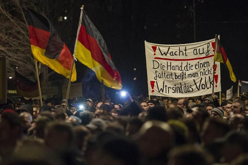 &nbsp;A picture taken on Dec 15, 2014, shows supporters of the PEGIDA movement, "Patriotische Europaeer gegen die Islamisierung des Abendlandes," which translates to "Patriotic Europeans Against the Islamification of the Occident," taking part in a r