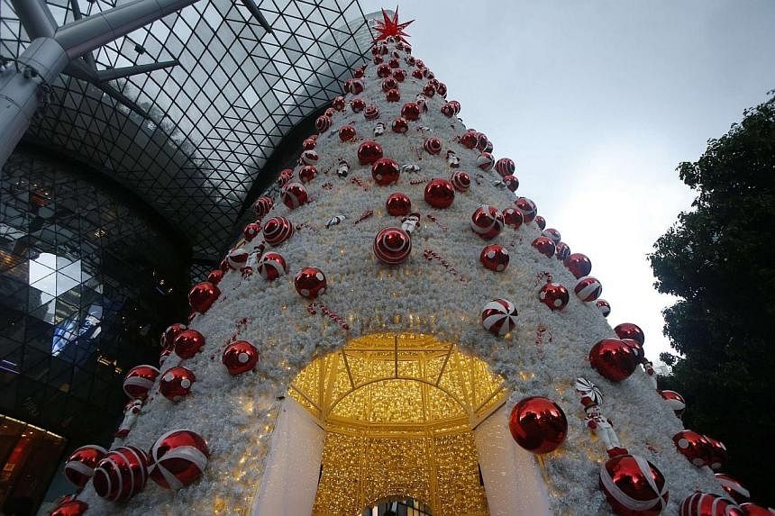 A Christmas tree decoration outside Ion Orchard along Orchard Road in Singapore. -- PHOTO: REUTERS
