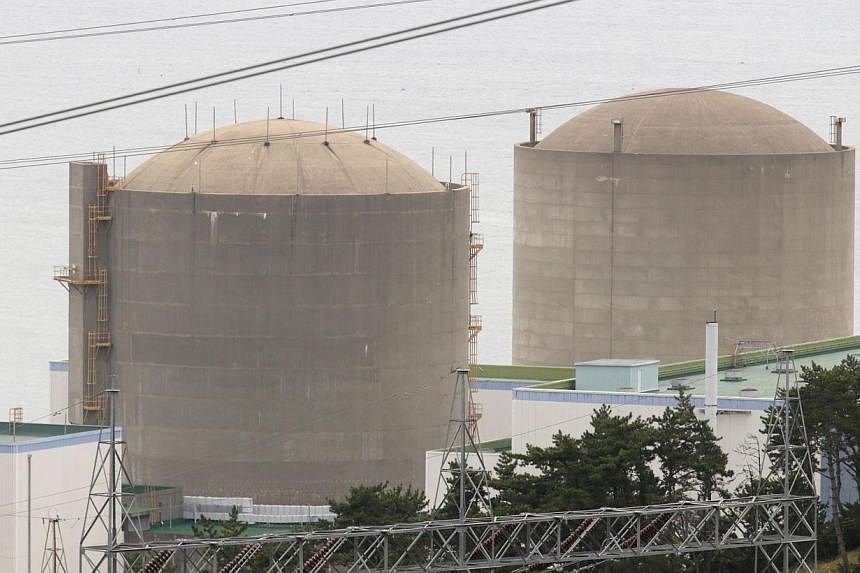 The Kori No. 1 reactor (right) and No. 2 reactor of state-run utility Korea Electric Power Corp (Kepco) are seen in Ulsan, about 410km south-east of Seoul in this Sept 3, 2013, file photo. -- PHOTO: REUTERS