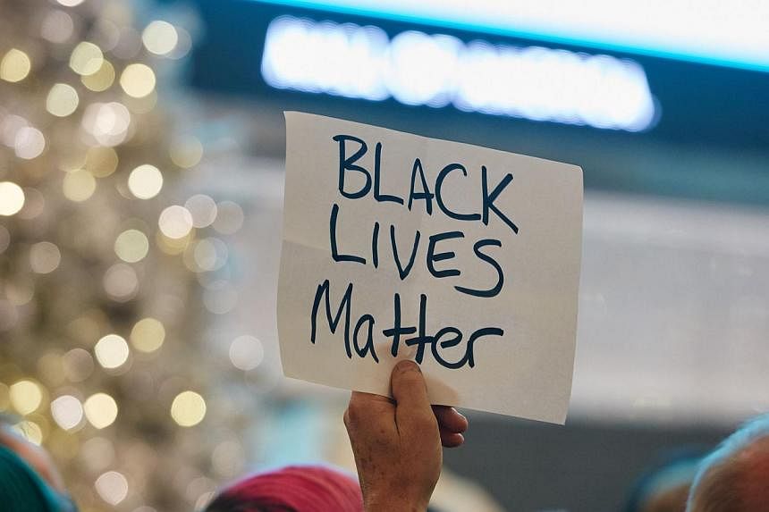 Thousands of protesters from the group "Black Lives Matter" disrupt holiday shoppers on Dec 20, 2014 at Mall of America in Bloomington, Minnesota. The phrase has become a rallying cry for demonstrators across the United States protesting grand jury d