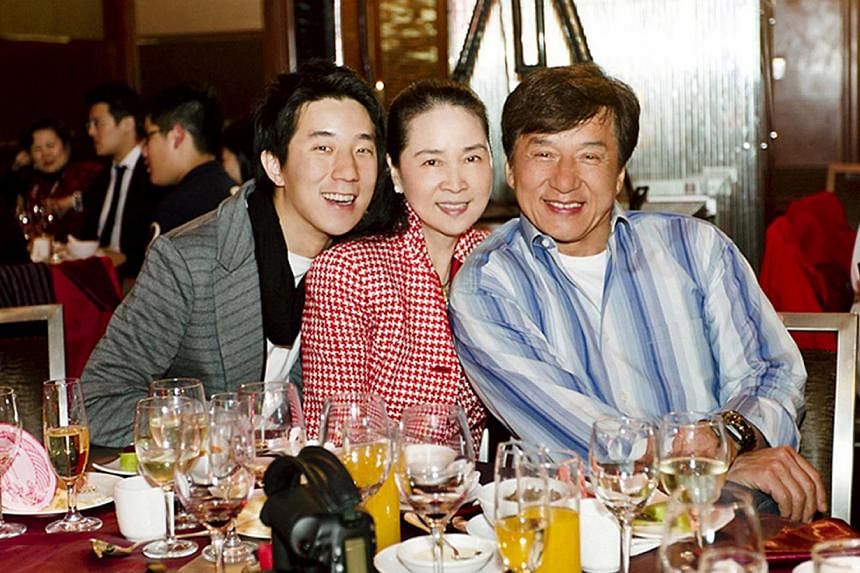 Jaycee Chan (left) with his parents, former actress Lin Feng-jiao and action superstar Jackie Chan, in 2012 at Lin's 60th birthday party. Movie star Jackie Chan said on Wednesday he had not used any of his connections to plead for mercy for his son J