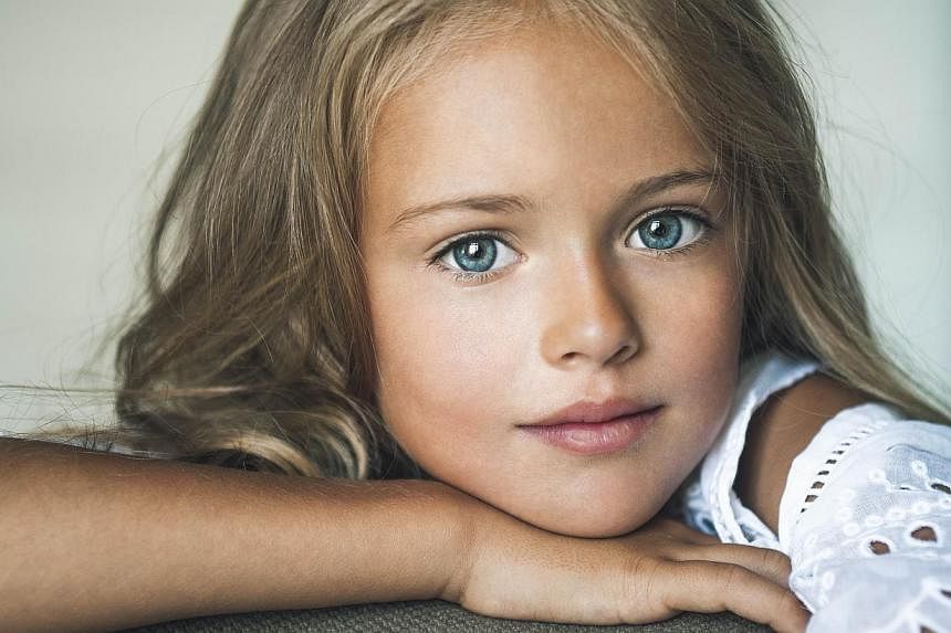 This handout photo released on Dec 11, 2014 by the Pimenova family shows Russian child supermodel Kristina Pimenova posing on Aug 7, 2013 in Moscow. -- PHOTO: AFP&nbsp;