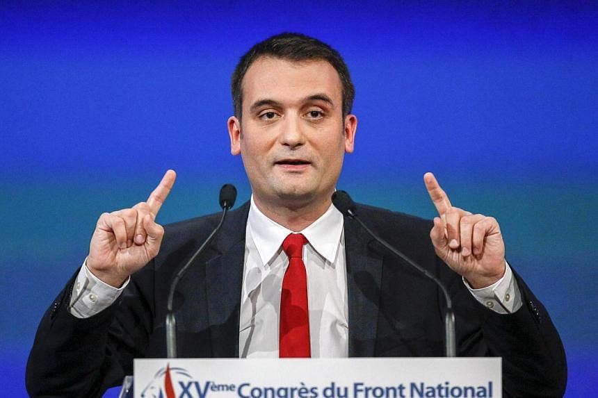 Florian Philippot, France's far-right National Front political party vice-president, delivers a speech during the party's congress in Lyon Nov 29, 2014. Gossip magazine Closer has been ordered by a court to pay €20,000 (S$32,000) in damages for "in