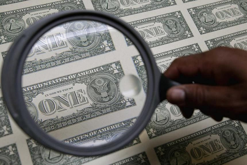 The US dollar has strengthened against the currencies of every Asian economy as well as those of the major economies elsewhere in the world. -- PHOTO: REUTERS