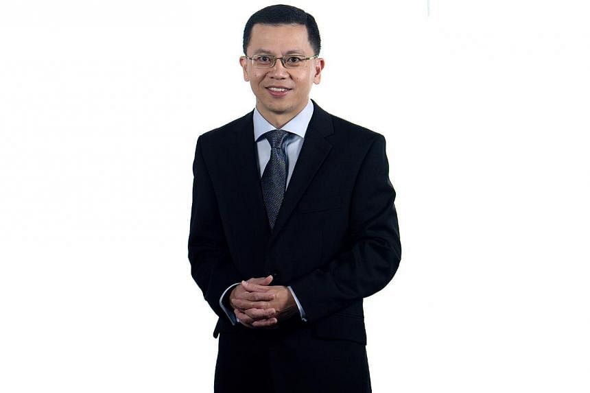 Permanent Secretary for the Ministry of Communications and Information, Mr Aubeck Kam (pictured), will be the new chairman of CCS, replacing Mr Lam Chuan Long.&nbsp;-- PHOTO:&nbsp;MINISTRY OF TRADE AND INDUSTRY