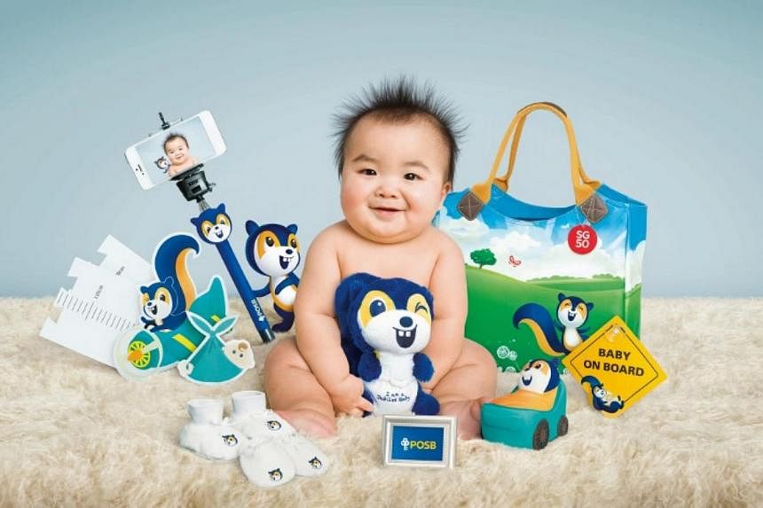 POSB's gift pack comprises a diaper bag, a pair of mittens and booties, a plush toy, a coin bank, a height chart, a bluetooth selfie stick, a 2R picture holder, a "baby on board" car sign and a pack of Zappy baby wipes. -- PHOTO: POSB