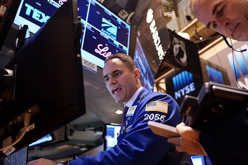 Wall Street stocks rose to fresh records Friday, as investors savored an outstanding US GDP report released earlier this week. -- PHOTO: AFP