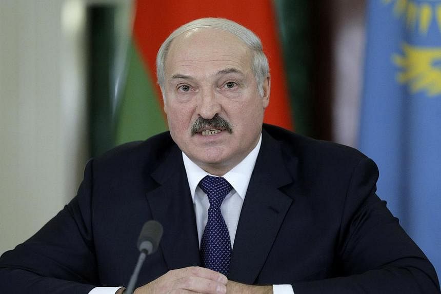 Belarus President Alexander Lukashenko speaks during a news conference after a meeting of the Eurasian Economic Union at the Kremlin in Moscow on Dec 23, 2014. -- PHOTO: REUTERS