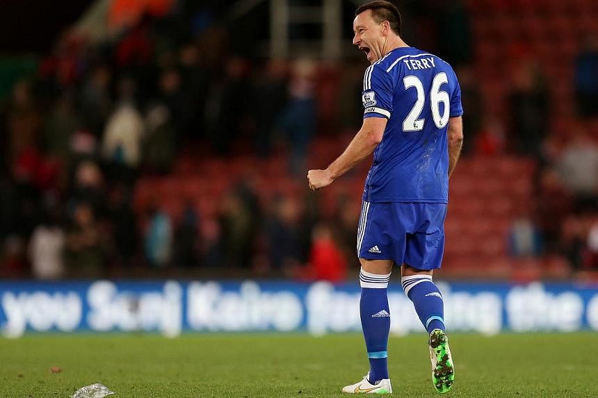 Chelsea's John Terry celebrates at the end of the match of the Barclays Premier League fixture against Stoke City at the&nbsp;Britannia Stadium. -- PHOTO: ACTION IMAGES