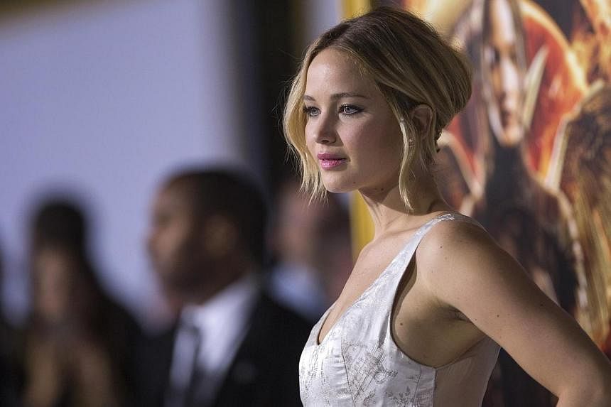 Hunger Games star Jennifer Lawrence has been ranked the highest-grossing actor in Hollywood by Forbes magazine. -- PHOTO: REUTERS