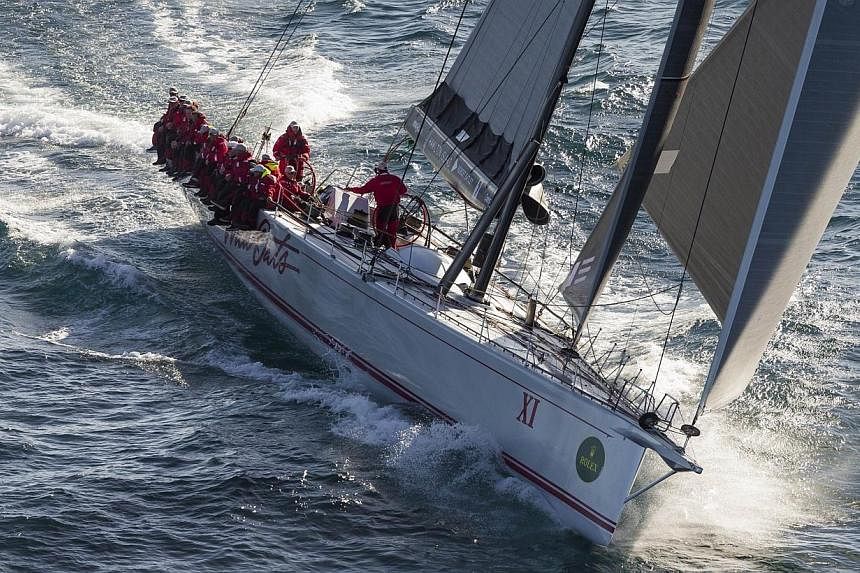 Australian yacht Wild Oats XI competing in the Sydney to Hobart yacht race on Dec 28, 2014. Wild Oats XI won its eighth line honours in the Sydney to Hobart race to become the most successful yacht in the history of the competition. -- PHOTO: AFP