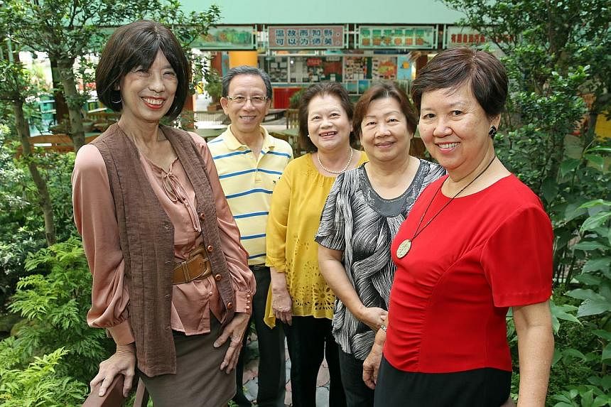 They retired from teaching some years ago but are now working full-time at Poi Ching School - (from left) Ms Evelyn Chua, maths teacher Tan Jwee Seng, 71, school counsellor Lim Siang Yong, 69, learning support coordinator Margaret Ho, 71, and music t