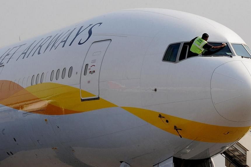 A Jet Airways plane with 125 passengers on board made an emergency landing at Kathmandu airport on Monday after a bird flew into its left engine, an aviation official said. -- PHOTO: AFP
