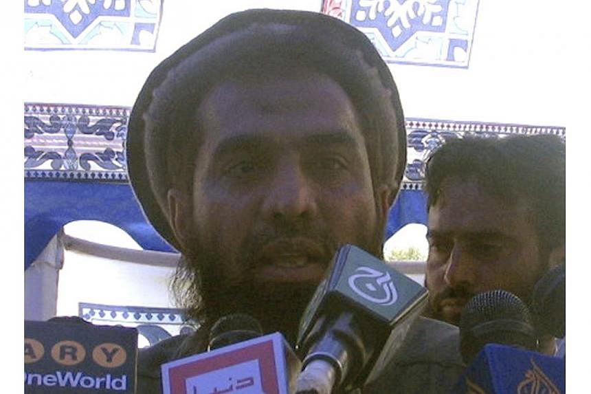 Zaki-ur-Rehman Lakhvi speaks during a rally in this April 21, 2008 file photo.&nbsp;A Pakistani court on Dec 29, 2014, suspended a detention order on Lakhvi, the alleged mastermind of the 2008 Mumbai attacks, government lawyers said, a move likely to
