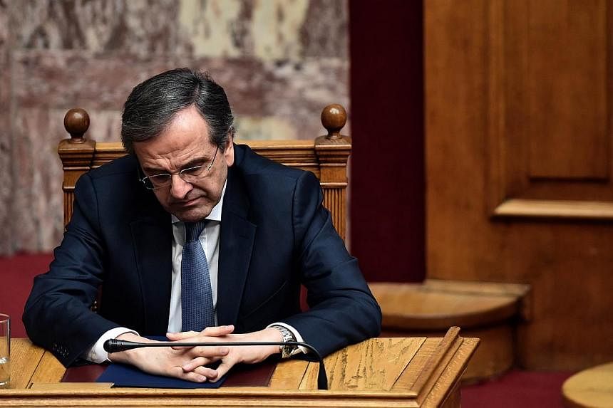 Greek Prime Minister Antonis Samaras attends the third round of a three-stage presidential election in the Greek parliament in Athens, on Dec 29, 2014.&nbsp;Greek lawmakers failed for a third time Monday to elect a new president, triggering a snap el