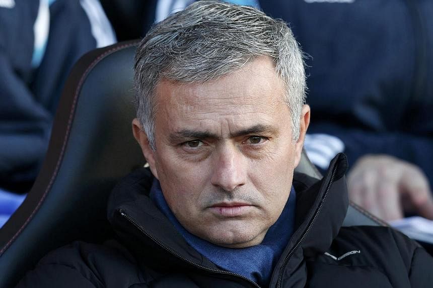 Chelsea manager Jose Mourinho sits in the dug out during his team's English Premier League soccer match against Southampton at St Mary's Stadium in Southampton, southern England, on Dec 28, 2014. -- PHOTO: REUTERS