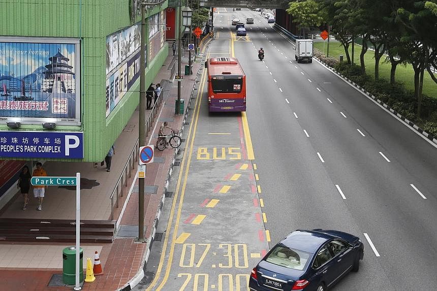 Additional road markings showing the operational hours of full-day bus lanes have been put up at seven locations, including Eu Tong Sen Street (above) and New Bridge Road. LTA said it will progressively extend the markings to all full-day bus lanes f