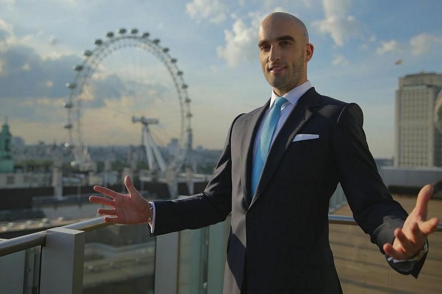 British cardtrick specialist Drummond Money-Coutts hopes to inspire young boys to be magicians. -- PHOTO: NATIONAL GEOGRAPHIC