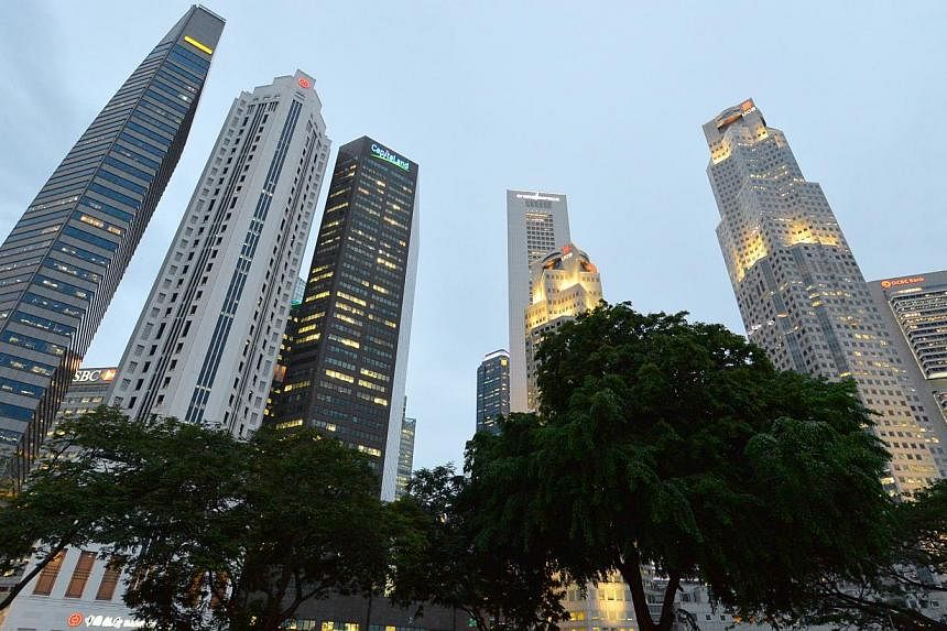 Singapore's annual economic growth likely slowed in the fourth quarter after manufacturing output in November came in much weaker than expected, a Reuters poll showed. -- PHOTO: ST FILE