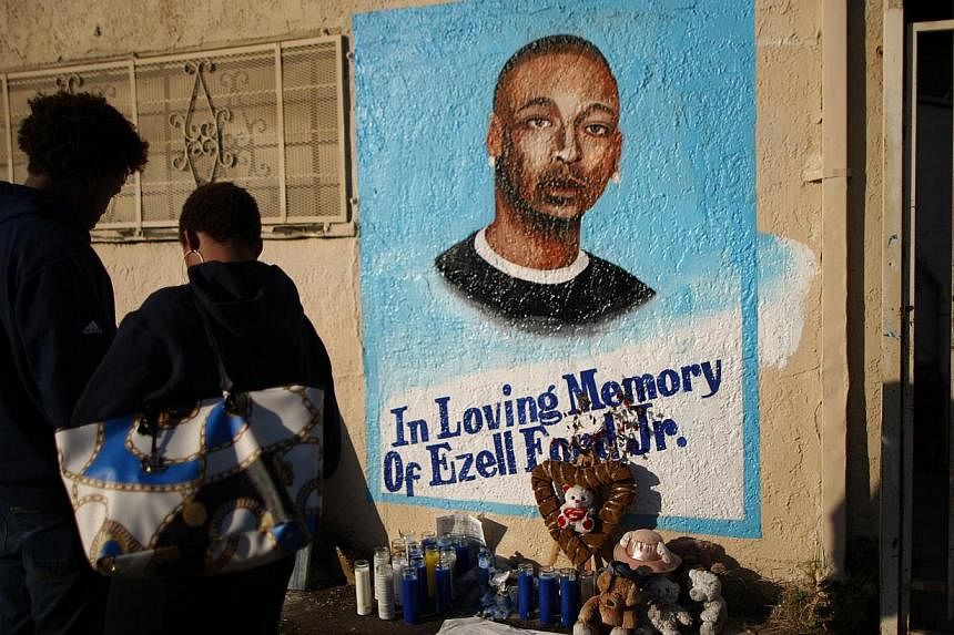 A mural of Ezell Ford at the site where he was shot and killed in August. -- PHOTO: AFP&nbsp;