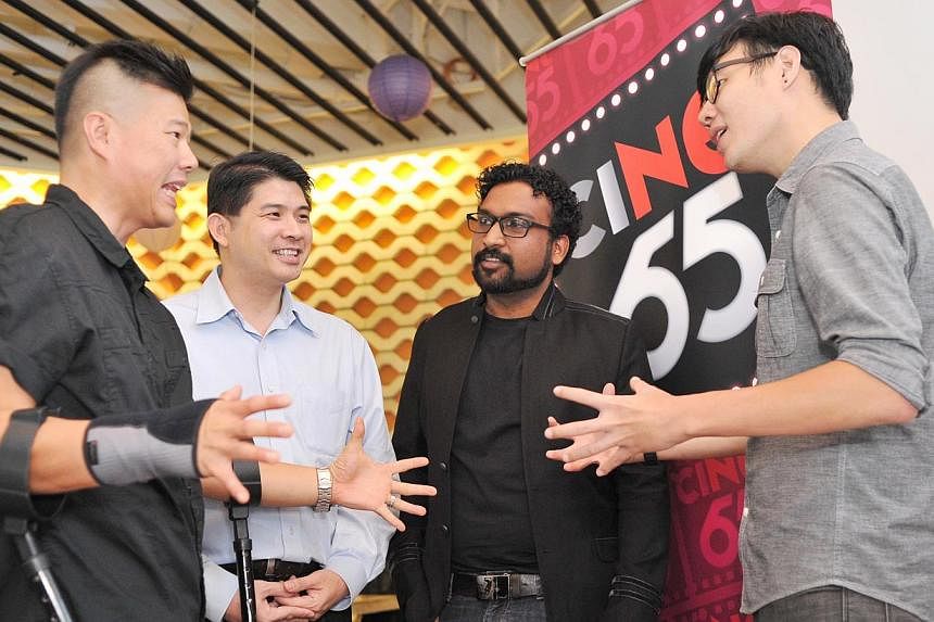 Commissioned film-makers of ciNE65's third season&nbsp;Bertrand Lee (extreme left), N. Mohamed Yahssir (second from right) and Kenny Tan (extreme right), sharing their experiences in making their respective short films with the&nbsp;director of Nexus