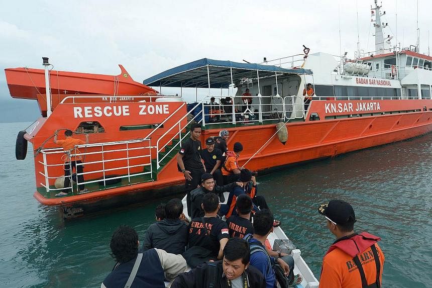 Members of an Indonesian search and rescue team prepare to set off to search for the missing plane from Manggar in East Belitung on Dec 30, 2014. -- PHOTO: AFP&nbsp;