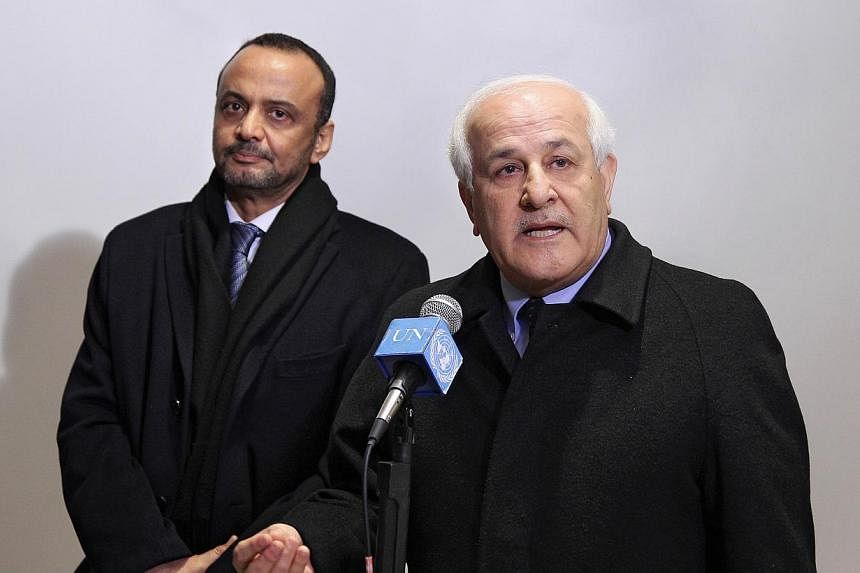 Riyad H. Mansour (right), Permanent Observer of the State of Palestine to the UN, and Sidi Mohamed Ould Boubacar, Permanent Representative of the Islamic Republic of Mauritania to the UN, in New York on Dec 30, 2014, following a meeting of Arab deleg
