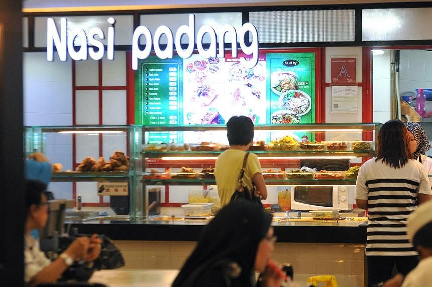 The food stall in Northpoint shopping centre was inspected and found to have hygiene lapses, and the stallholder was prosecuted and fined under the Environmental Public Health (Food Hygiene) Regulations. -- PHOTO: ST FILE