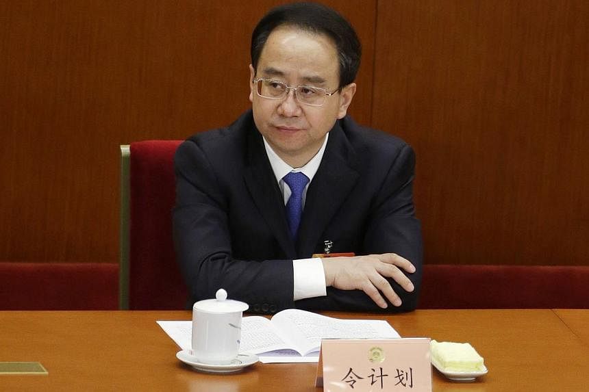 Mr Ling Jihua, a&nbsp;senior Chinese Communist Party official who was a close aide to former president Hu Jintao, has been removed from his post amid a corruption investigation, state media said on Wednesday. -- PHOTO: REUTERS
