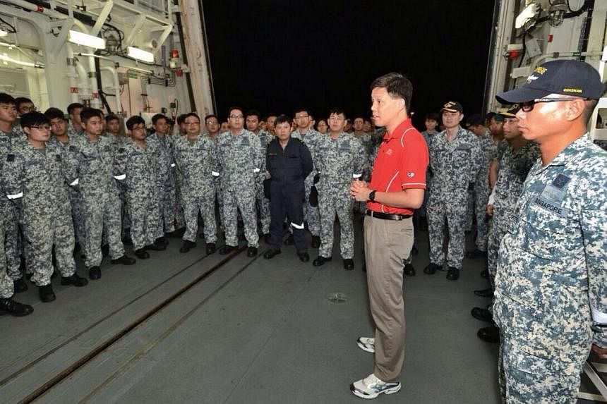 Second Minister for Defence Chan Chun Sing interacting with Republic of Singapore Navy (RSN) servicemen on board RSS Supreme on Dec 29, 2014. -- PHOTO: MINDEF